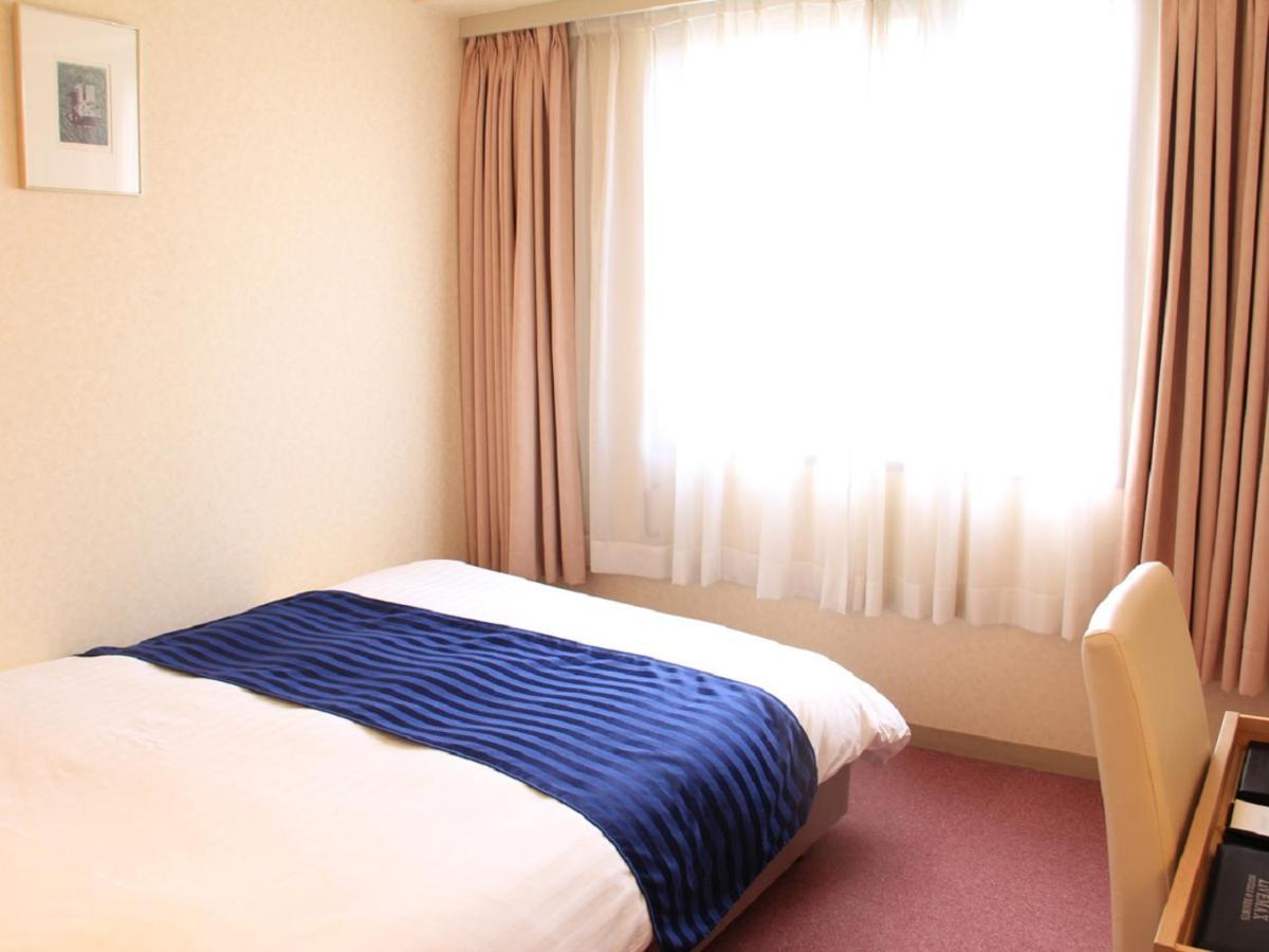 Hotel Livemax Budget Kagoshima Buitenkant foto