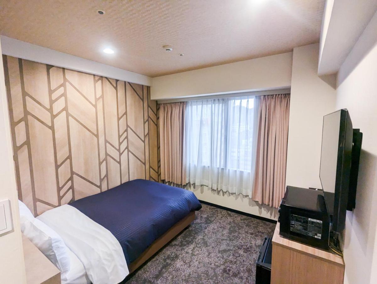 Hotel Livemax Budget Kagoshima Buitenkant foto